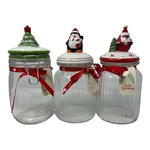 2 Glass Christmas Canisters Tree, and Penguin. (Sold Separately) The Santa sold.